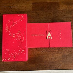 Hermes / Bottega Veneta red envelopes